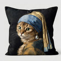 Pillow with a cat wearing a blue headscarf and pearl earring design, inspired by famous art.