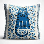 Decorative pillow with blue cat design on a white background